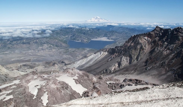 Rim of Mt St Helens lava dome in foreground-left Spirit Lake with yo log jam mid-ground and Mt Rainier in background  by clive_dexx