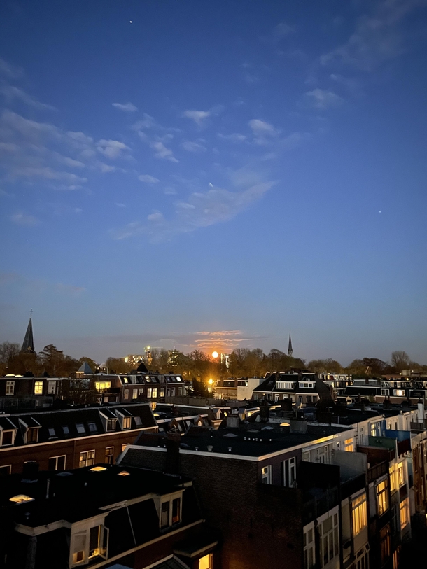 Rising pink moon over Utrecht NL