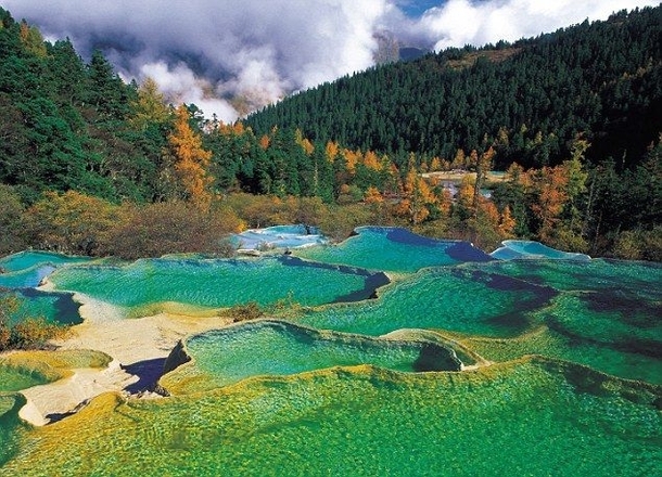 rock pools at Huanglong Natural Preserve Jiuzhaigou National Park in Chinas Sichuan province