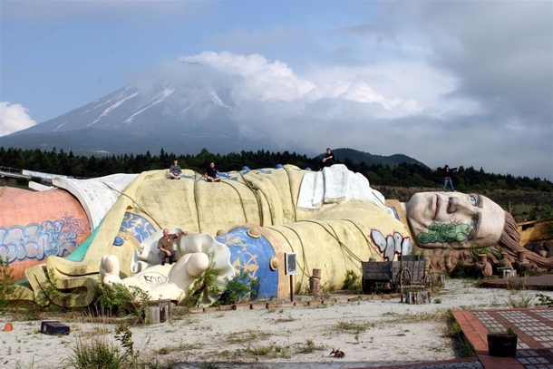 Ruins of Gullivers Kingdom Amusement Park in Japan with Mount Fuji in the distance 