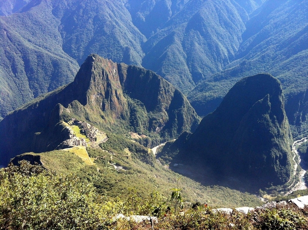 Ruins of Machu Picchu and surrounding mountains as seen from the mountain of Machu Picchu 