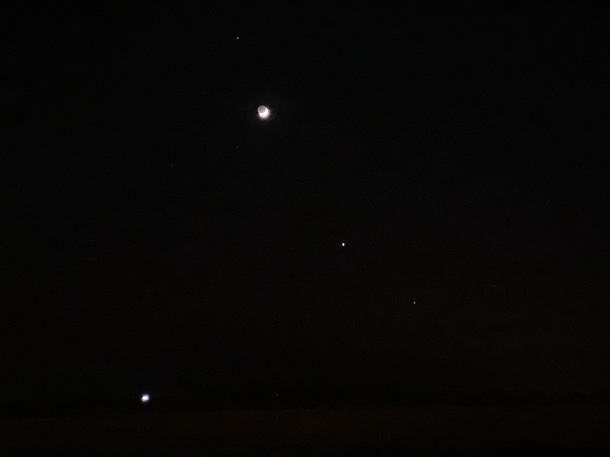 Saturn on the top and then the moon and venus and Jupiter at the bottom