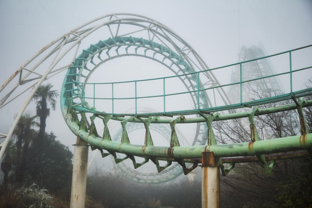 Screw Coaster from the ill fated Nara Dreamland theme park in Japan during a misty Spring morning in  Photo credit chrisluckhardt
