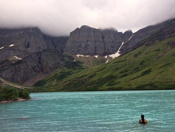 Shes far braver than I for swimming in that freezing water Cracker Lake Glacier National Park 