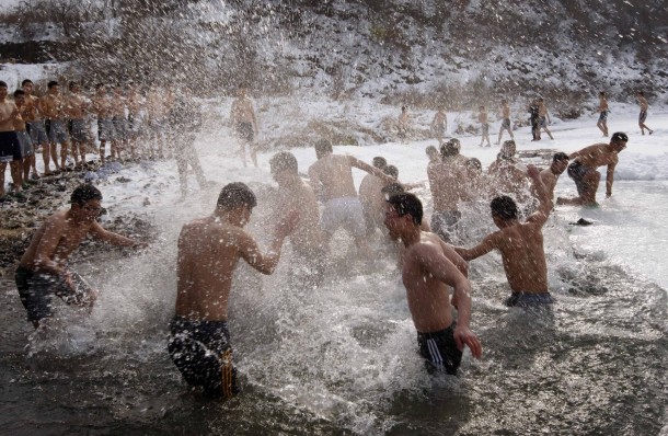 South Korean army soldiers take a dip in ice water during a winter training exercise in Cheorwon 