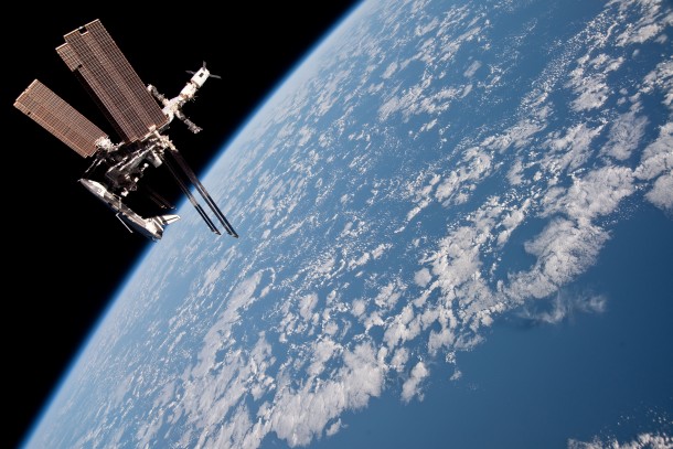 Space shuttle Endeavour docked with the International Space Station  miles above the Earth 
