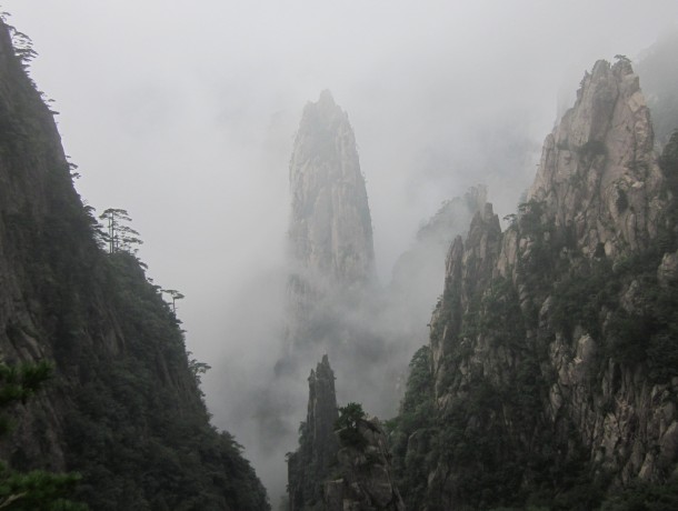 Spire Through The Mist Huangshan China 