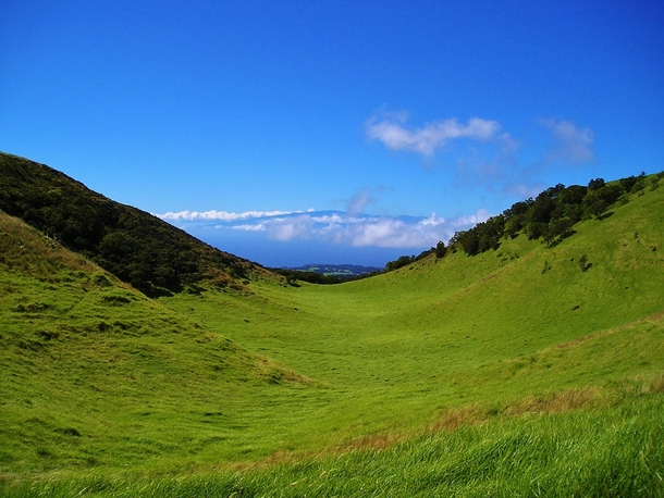Standing on Chichi Mountain Big Island looking towards Haleakala Maui 