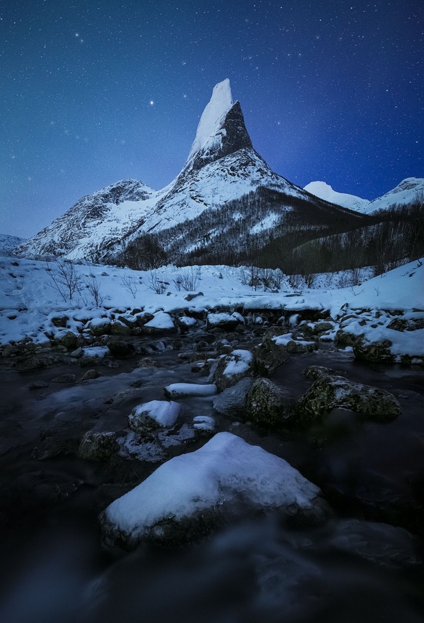 Stetinden national mountain of Norway during a relaxed starry night 