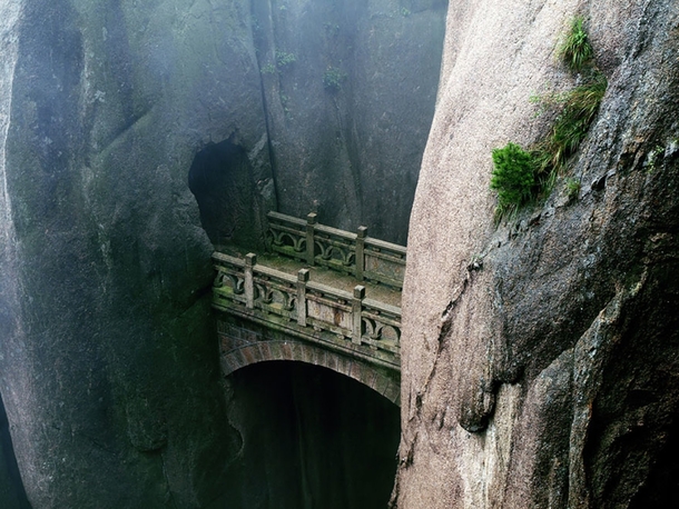 Stone bridge between  cliffs Huangshan Bridge - China 