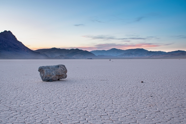 Sun setting on the sailing stones of Racetrack Playa in Death Valley NP  IG alexkendig