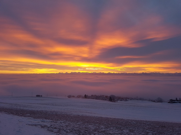 Sunrise above Switzerlands mist 