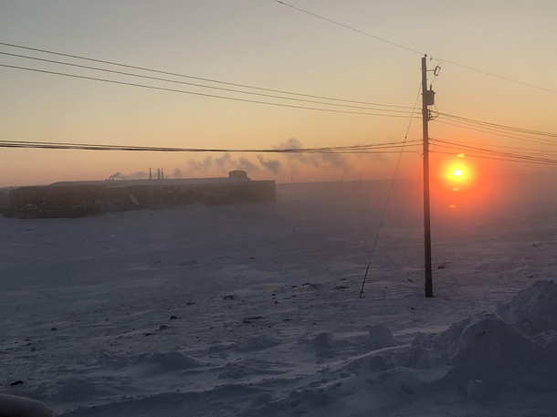 Sunrise in Canadian High Arctic - degrees Celsius in Cambridge Bay Nunavut March   In the picture is the  million dollar Canadian High Arctic Research Station OC