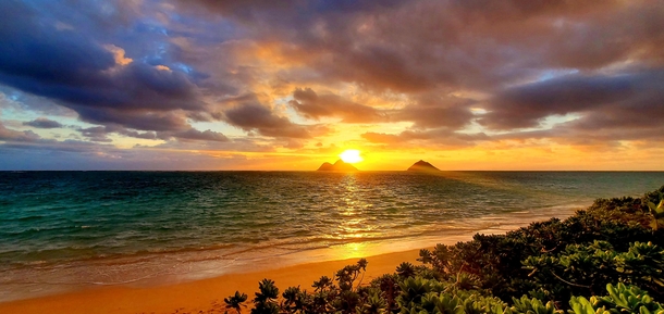Sunrise in Lanikai Beach Hawaii overlooking the Twin Islands OC 