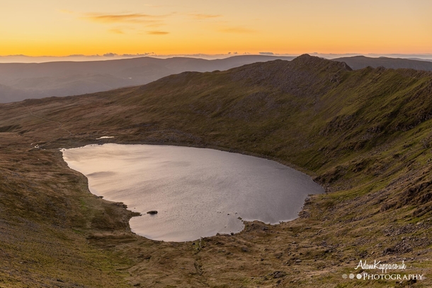 Sunrise over Red tarn and Striding edge The Lake District 