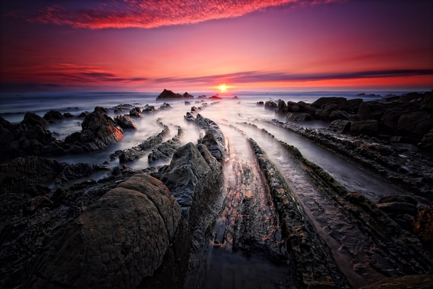 Sunset at Barrika beach Spain  by rgr