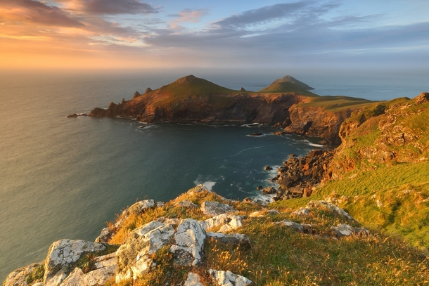 Sunset over the coastline of North Cornwall England known as The Rumps  by Gary King