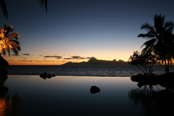 Sunset viewed from the infinity pool at a hotel in Papeete Tahiti French Polynesia photo by Remi Jordan 