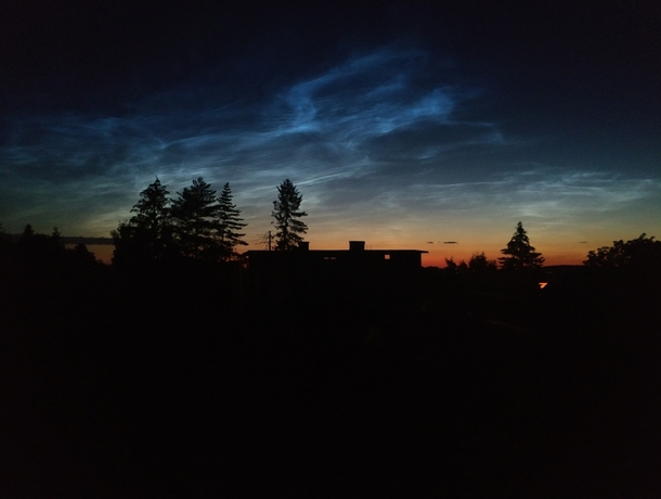 Sunset with noctilucent clouds over Southern Poland