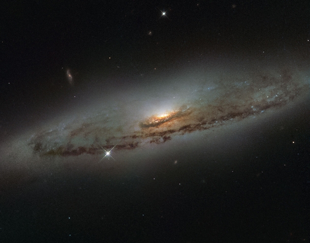 Supermassive and super-hungry - the spiral galaxy NGC  located over  million light-years away in the constellation of Virgo 