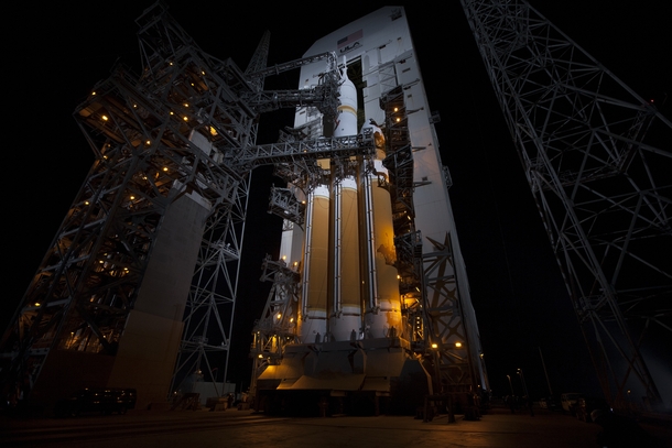 Taken last week The launch gantry is rolled back to reveal NASAs Orion spacecraft mounted atop a United Launch Alliance Delta IV Heavy rocket Awesome photo to gawk at OS by NASAKim Shiflett