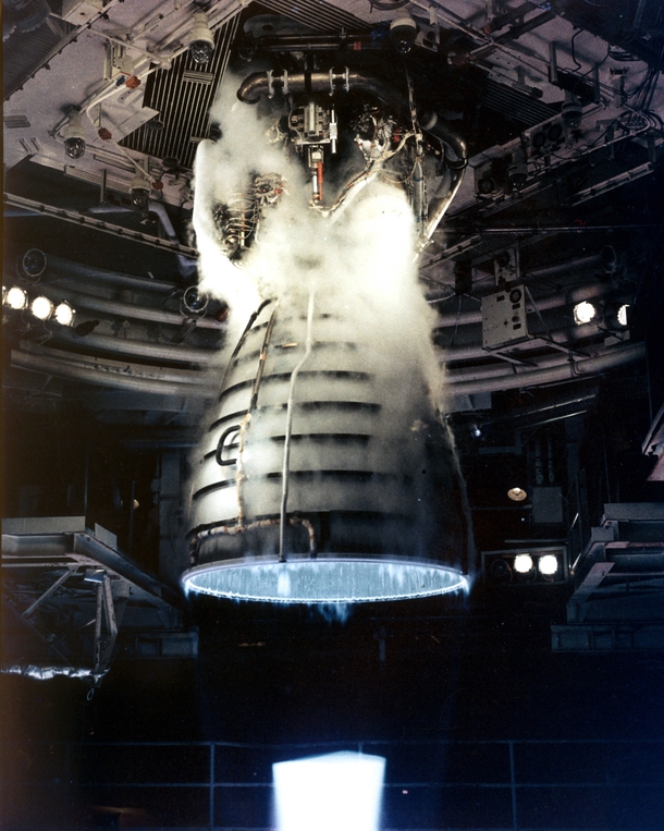 Test firing photo of Space Shuttle main engine The liquid-fueled cryogenic rocket engine produces a blue flame from the bell-shaped nozzle also called the mach diamond 