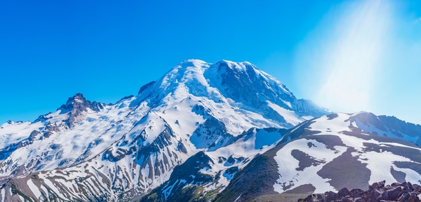 Thats a lot of snow in July Mt Rainier panorama in summer after a strong winter 