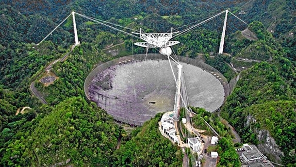 The Arecibo Observatory in Puerto Rico is used for Space and Atmospheric Research Sadly the National Science Foundation has announced it is damaged beyond repair and needs to be demolished If it looks familiar it doubled as Alec Trevelyans Lair in Goldene