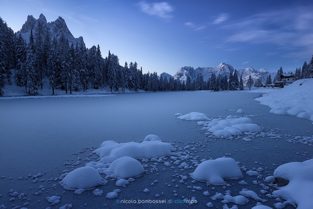 The blue hour on frozen Lake Antorno under the Dolomites  Photo by Nicola Bombassei xpost from rItalyPhotos