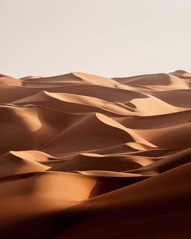 The calming curves of Abu Dhabis mountainous dunes UAE 