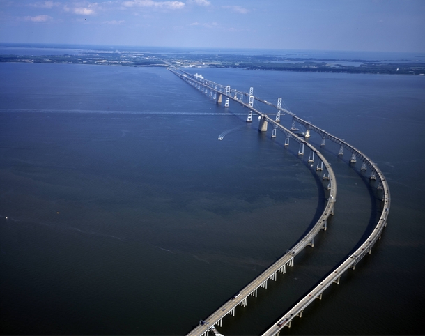The Chesapeake Bay Bridge officially named the William Preston Lane Jr Memorial Bridge The original span opened in  and at the time it was the worlds longest continuous over-water steel structure The parallel span was added in  by Carol M Highsmith ca  