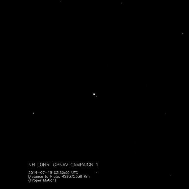 The closest pic of Pluto and Charon taken from approaching New Horizon 