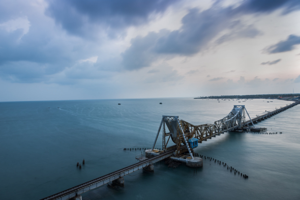 The construction of Pambam bridge INDIA commenced in  and it was opened on February   Central part of the bridge was designed by German engineer Scherzer This part that is th span midway along the bridge is called the Scherzer span and it opens up to allo