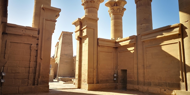 The contrast between the Egyptian architecture of the Temple of Philae and the Roman style of Trajans Kiosk - Aswan Egypt