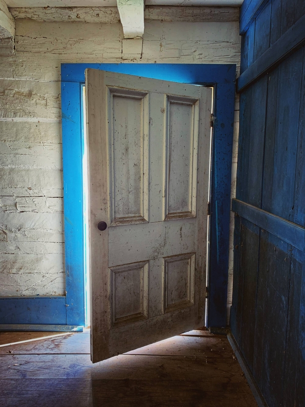 The front door of an old settlers log cabin in Ontario Canada