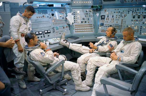 The Gemini  prime and backup crew relaxing at the Gemini Mission Simulator in  From left to right William Anders Richard Gordon Charles Conrad and Neil Armstrong 
