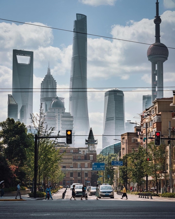 The giants of Pudong district seen from the streets of Shanghai China