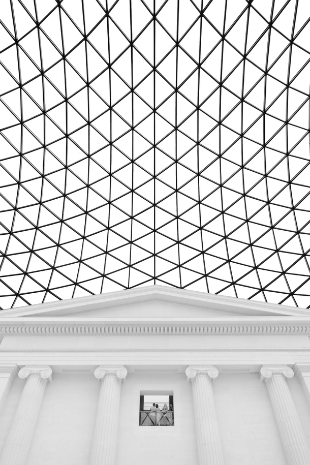 The Great Court of the The British Museum by Foster and Partners  at its connection point to the original South Entrance by Sir Robert Smirke  