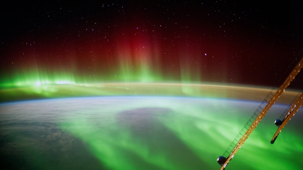 The ISS floating above the Aurora Borealis  by Alexander Gerst ESA astronaut