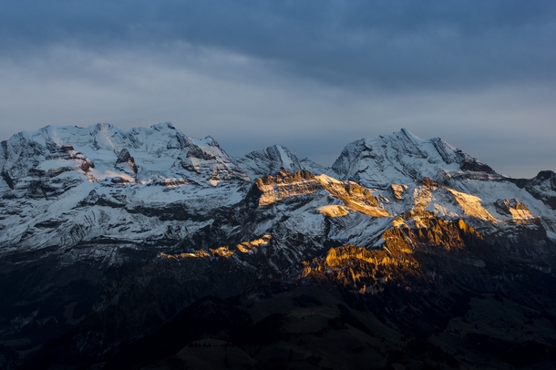 The last sunlight of the day on some mountains in the Swiss Alps 