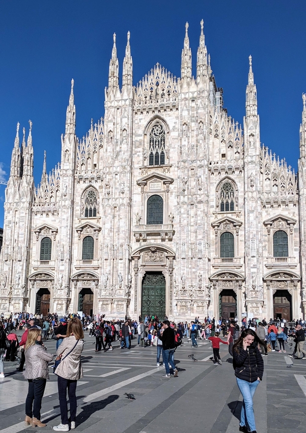 The magnificent Gothic architecture of Duomo Milano on a fine spring day 