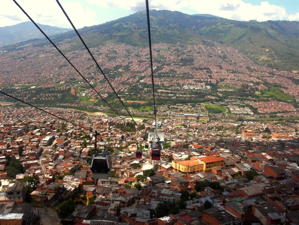 The MetroCable gondola system high above Medelln Colombia Cable cars are an important part of the mass transit system in this mountainous city connecting far-flung suburbs and carrying  riders a day 