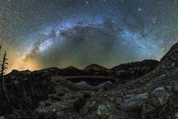 The Milky Way arches over Mt Lassen and Lake Helen in Lassen Volcanic National Park in Northern California 