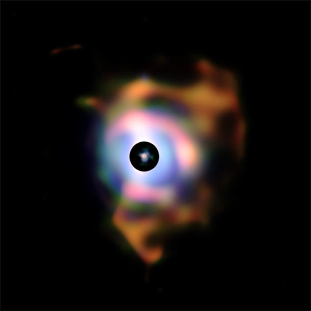 The nebula around Betelgeuse - the added black disk covering up Betelgeuse itself has a diameter around sixty times Earths orbit Taken by the VISIR infrared camera VLT 