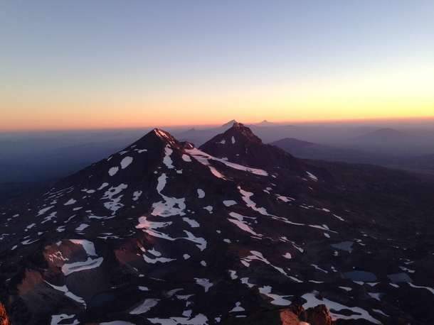 The Oregon Cascades from the summit of South Sister just after sunrise 