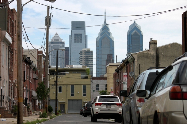 The Philadelphia skyline towering over the row homes of South Philly 