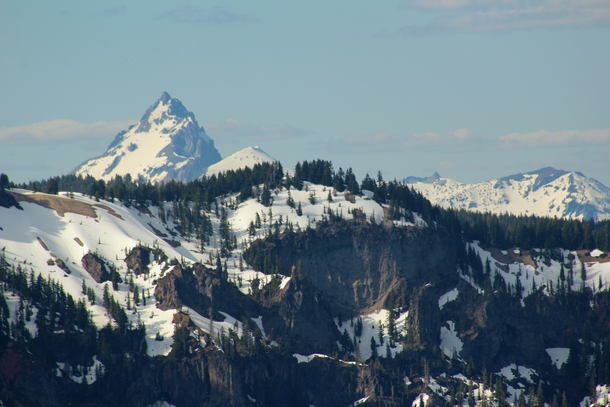 The rim of Crater Lake with Mt Thielsen in the background Oregon  OC