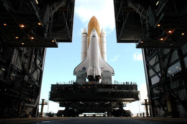 The Shuttle Discovery begins the long roll towards NASAs Kennedy Space Center  Credit NASAKSC