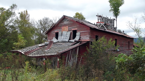 The slow collapse of the Coghill Grist Mill in McMinn County Tennessee Built in  and closed in  Located in an area that was hit by the tornado outbreak of  
