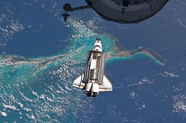 The space shuttle Atlantis flying over the Bahamas on its way to the ISS  Credit NASA